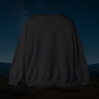 Black sweatshirt against a dark sky with stars